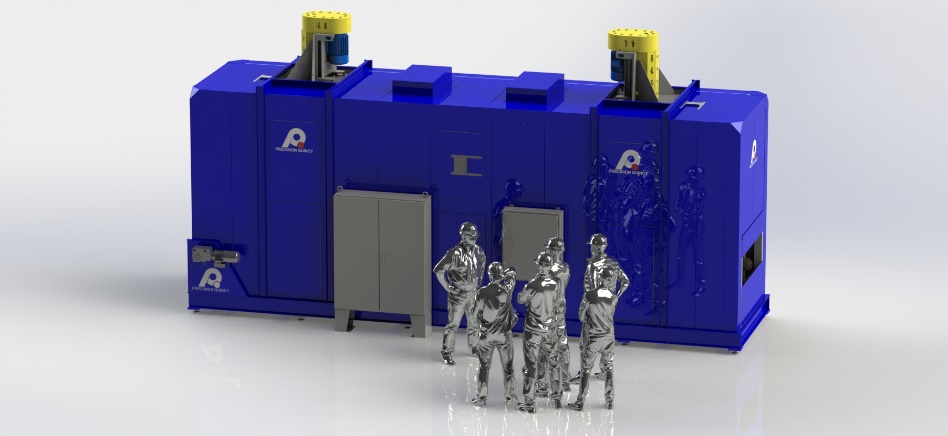 image002 Conveyorized indexing oven built by PQ Ovens viewed from an angle with workers standing in front